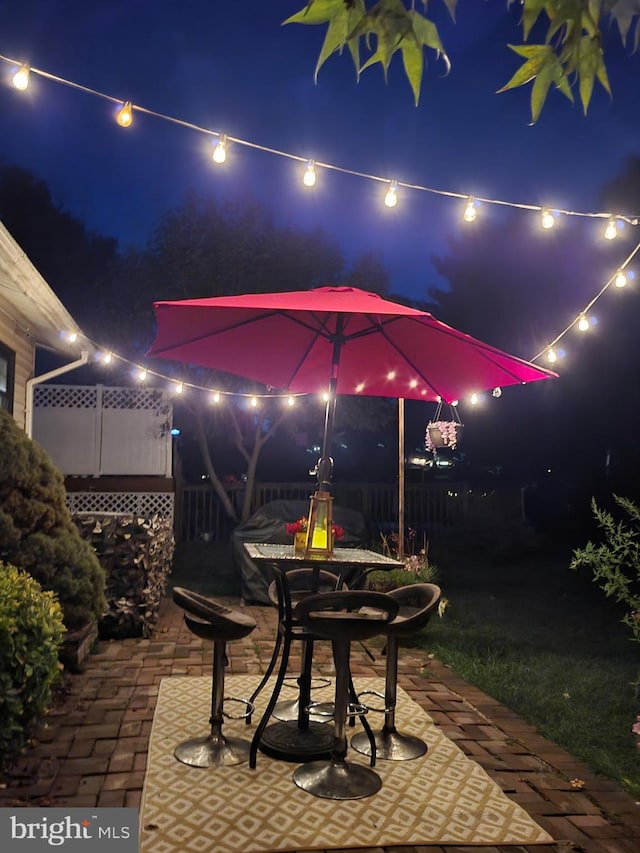 patio at twilight with fence