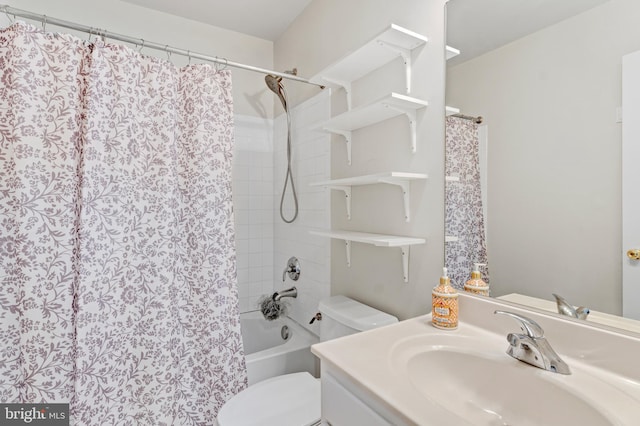 full bathroom featuring vanity, toilet, and shower / tub combo with curtain