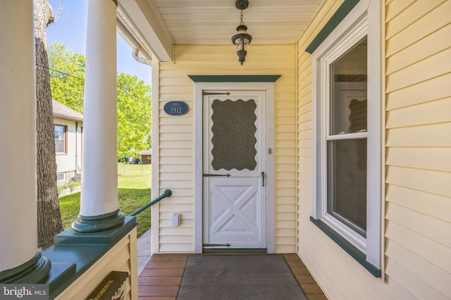 entrance to property with a porch