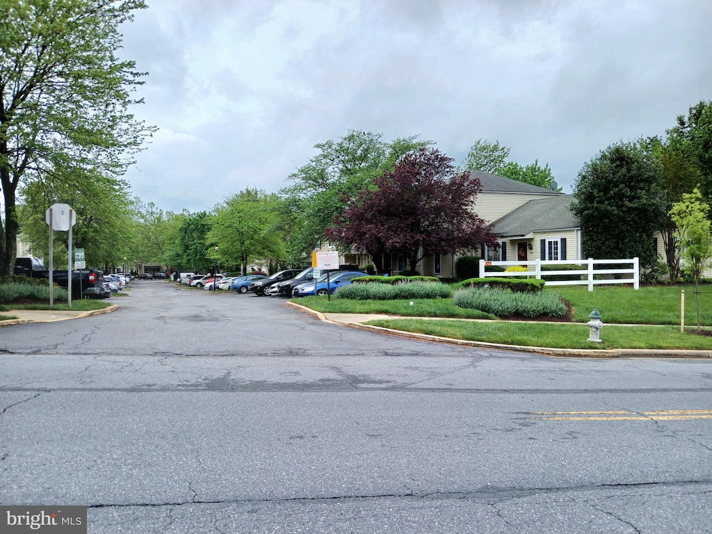 11427 Ledbury Way, Germantown, MD 20876 - view of asphalt road featuring traffic signs and curbs