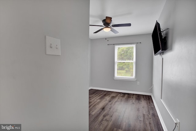 6608 Eaglewing Ln, Fort Washington, MD 20744 - empty room featuring a ceiling fan, wood finished floors, and baseboards