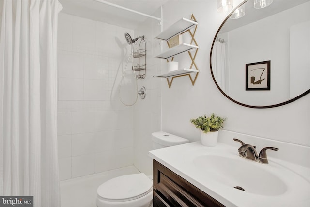 6608 Eaglewing Ln, Fort Washington, MD 20744 - bathroom with toilet, a tile shower, and vanity