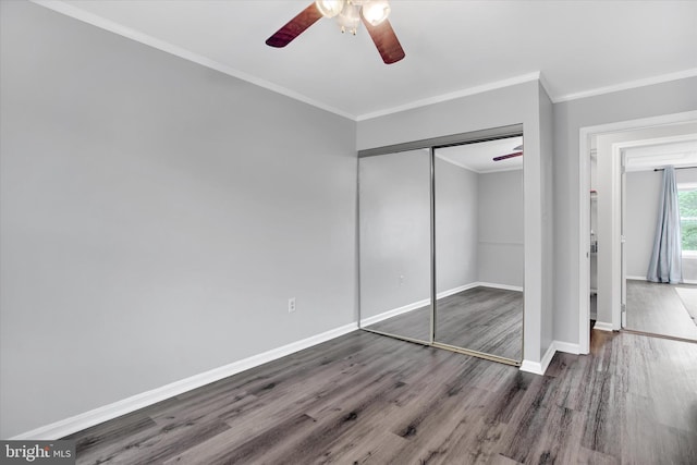 6608 Eaglewing Ln, Fort Washington, MD 20744 - unfurnished bedroom with wood finished floors, baseboards, ornamental molding, a closet, and ceiling fan