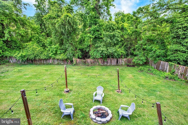6608 Eaglewing Ln, Fort Washington, MD 20744 - view of yard with a fire pit