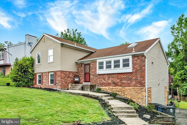 6608 Eaglewing Ln, Fort Washington, MD 20744 - tri-level home with brick siding and a front lawn