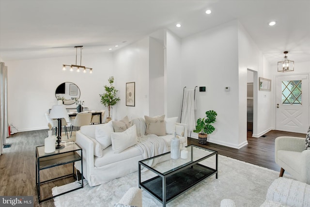 6608 Eaglewing Ln, Fort Washington, MD 20744 - living area featuring wood finished floors, a chandelier, baseboards, and recessed lighting