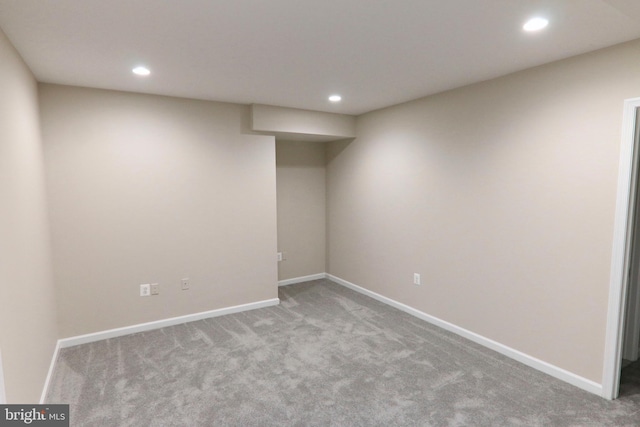 9724 Middleton Ridge Rd, Vienna, VA 22182 - finished basement with carpet, baseboards, and recessed lighting