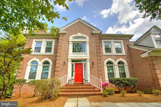9724 Middleton Ridge Rd, Vienna, VA 22182 - colonial house featuring brick siding