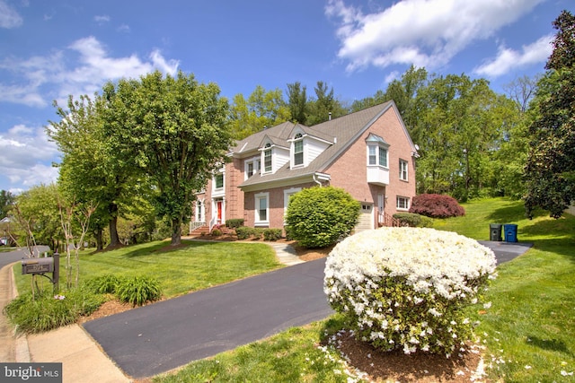 9724 Middleton Ridge Rd, Vienna, VA 22182 - exterior space featuring a yard and brick siding
