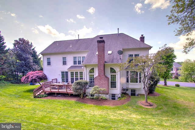 9724 Middleton Ridge Rd, Vienna, VA 22182 - rear view of house with a chimney, a wooden deck, a shingled roof, and a lawn