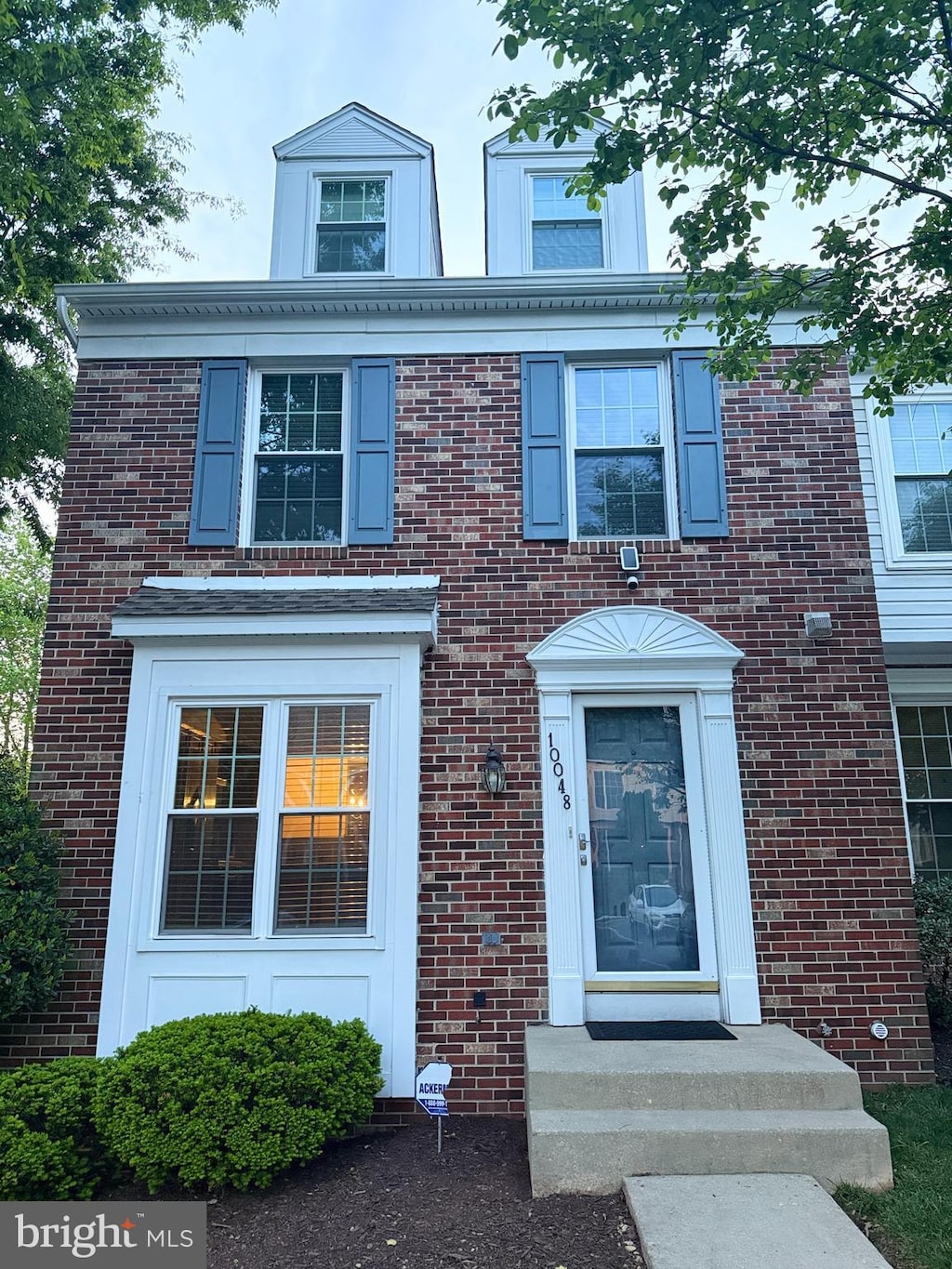view of front of home with brick siding