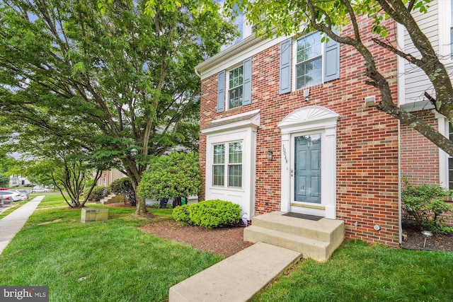 10048 Quiet Brook Ln, Clinton, MD 20735 - colonial inspired home with brick siding and a front lawn