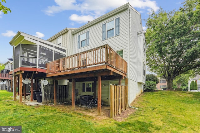 10048 Quiet Brook Ln, Clinton, MD 20735 - rear view of house with a sunroom, a yard, a deck, and cooling unit
