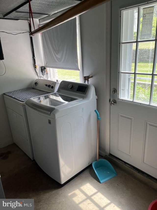 7757 Green Valley Rd, Wyncote, PA 19095 - clothes washing area featuring washer and dryer and laundry area