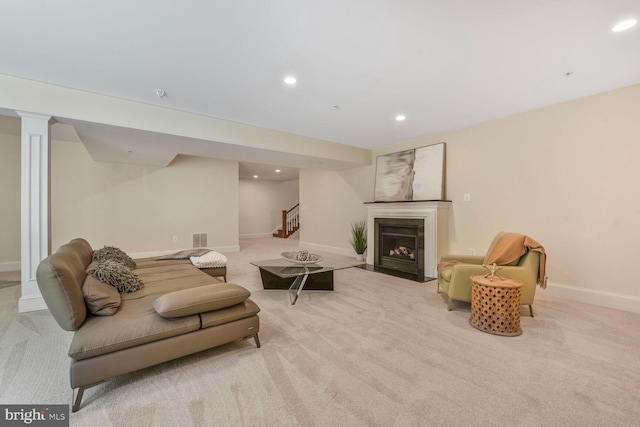living area featuring carpet floors, recessed lighting, baseboards, and visible vents