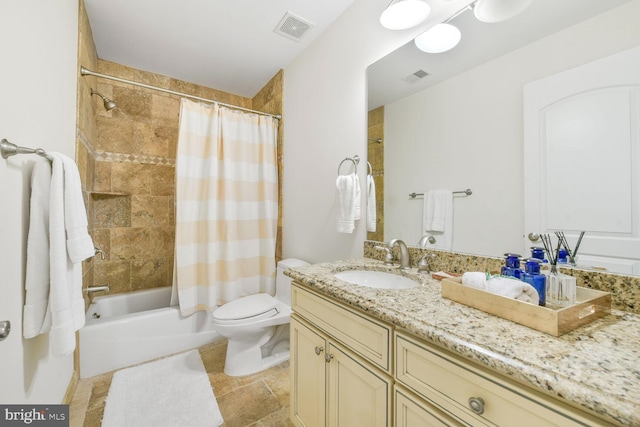 bathroom with vanity, shower / bath combination with curtain, toilet, and visible vents