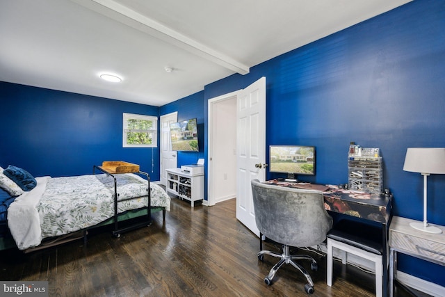 bedroom with wood finished floors and beamed ceiling