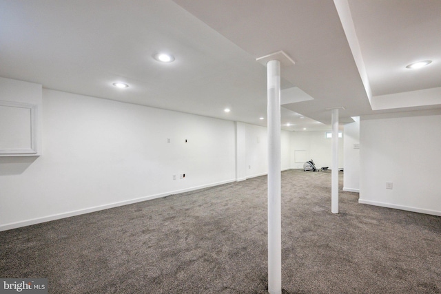 finished basement featuring carpet floors, recessed lighting, and baseboards