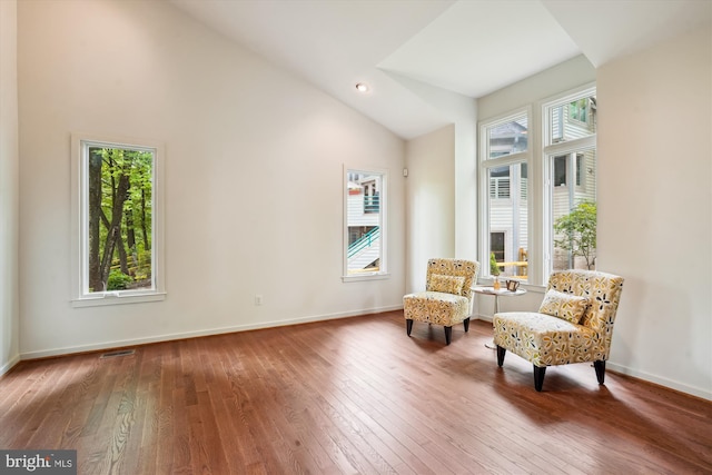 1145 Water Pointe Ln, Reston, VA 20194 - sitting room with wood-type flooring, vaulted ceiling, and baseboards