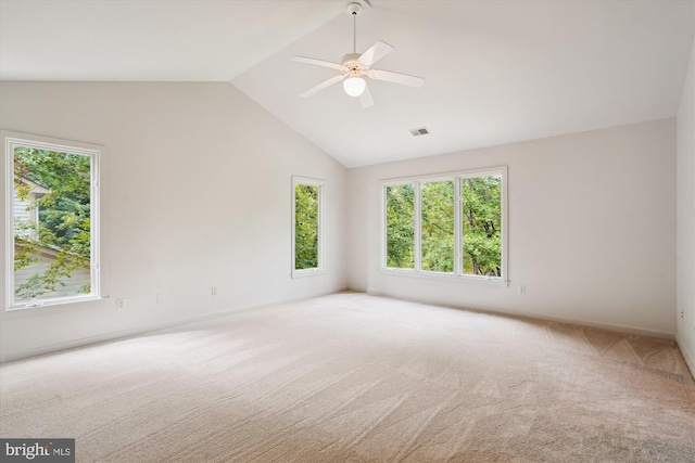 1145 Water Pointe Ln, Reston, VA 20194 - spare room featuring plenty of natural light, lofted ceiling, carpet flooring, ceiling fan, and baseboards