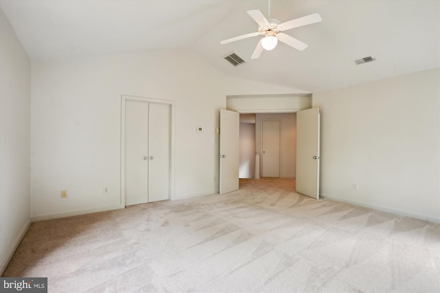 1145 Water Pointe Ln, Reston, VA 20194 - unfurnished bedroom with vaulted ceiling, light carpet, a ceiling fan, baseboards, and a closet