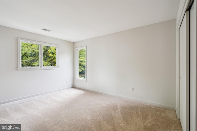 1145 Water Pointe Ln, Reston, VA 20194 - unfurnished bedroom with carpet flooring, baseboards, and a closet