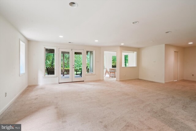 1145 Water Pointe Ln, Reston, VA 20194 - empty room featuring light colored carpet, baseboards, recessed lighting, and french doors
