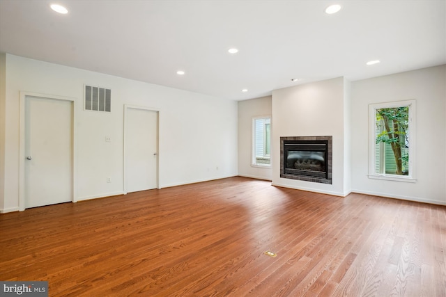 1145 Water Pointe Ln, Reston, VA 20194 - unfurnished living room featuring wood finished floors, a fireplace, recessed lighting, and baseboards