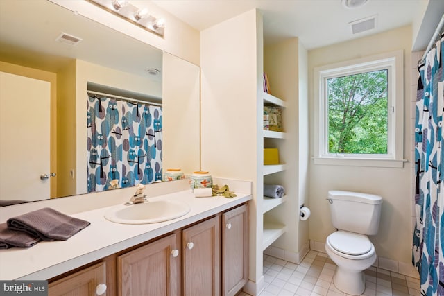 1145 Water Pointe Ln, Reston, VA 20194 - bathroom with toilet, tile patterned floors, vanity, and baseboards