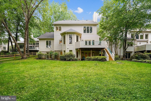 1145 Water Pointe Ln, Reston, VA 20194 - back of property with a chimney, stairway, and a deck