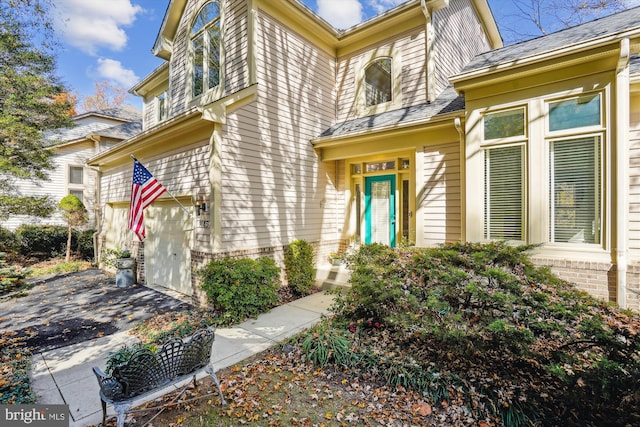 1145 Water Pointe Ln, Reston, VA 20194 - entrance to property with a garage and asphalt driveway