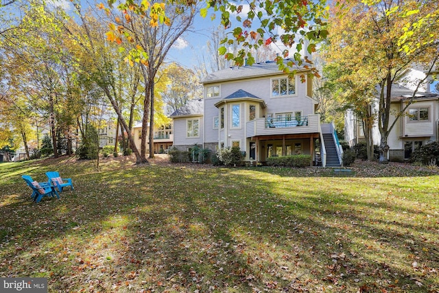 1145 Water Pointe Ln, Reston, VA 20194 - back of property with stairway, a wooden deck, and a lawn