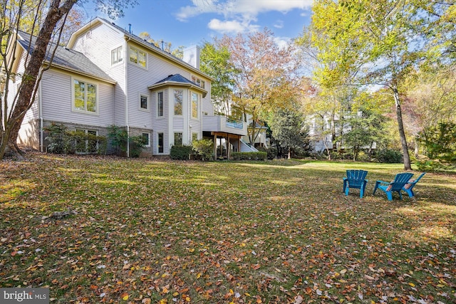 1145 Water Pointe Ln, Reston, VA 20194 - view of grassy yard featuring a deck
