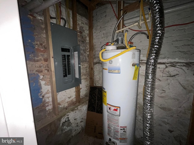 utility room featuring water heater and electric panel
