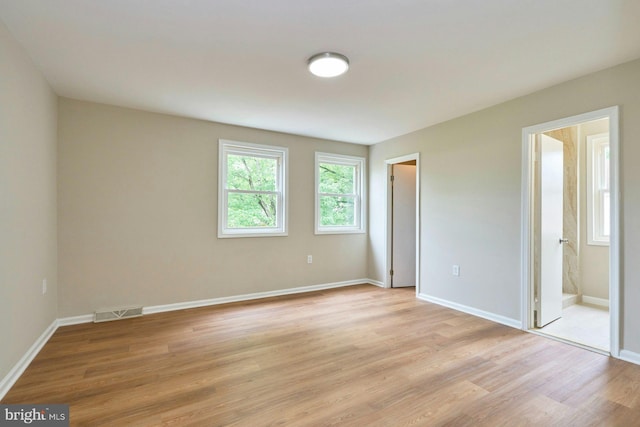 8321 Irongate Way, Manassas, VA 20109 - unfurnished bedroom with light wood finished floors and baseboards