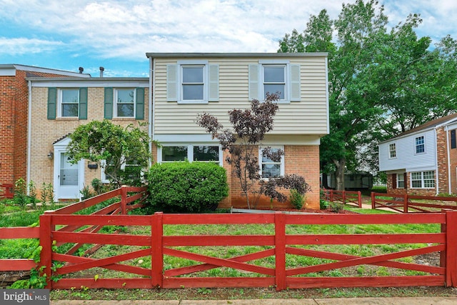 8321 Irongate Way, Manassas, VA 20109 - view of front of home featuring brick siding and a fenced front yard