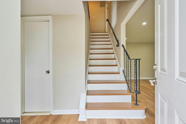8321 Irongate Way, Manassas, VA 20109 - stairs with wood finished floors, recessed lighting, and baseboards