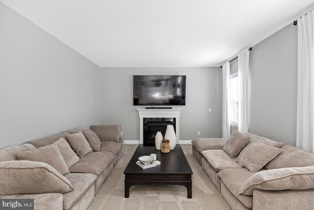 living room with a fireplace