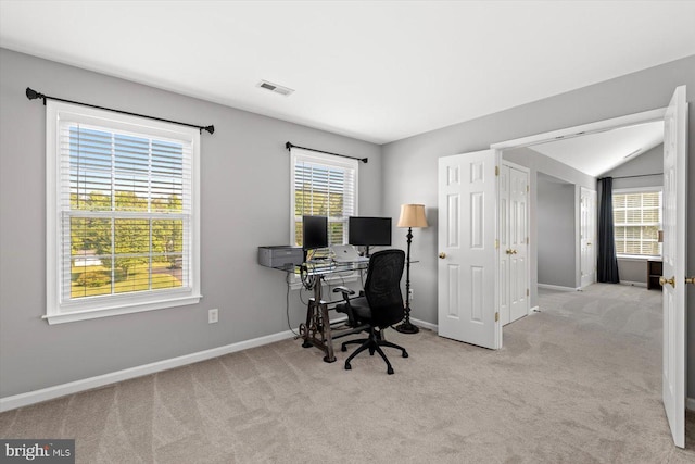 carpeted office with baseboards