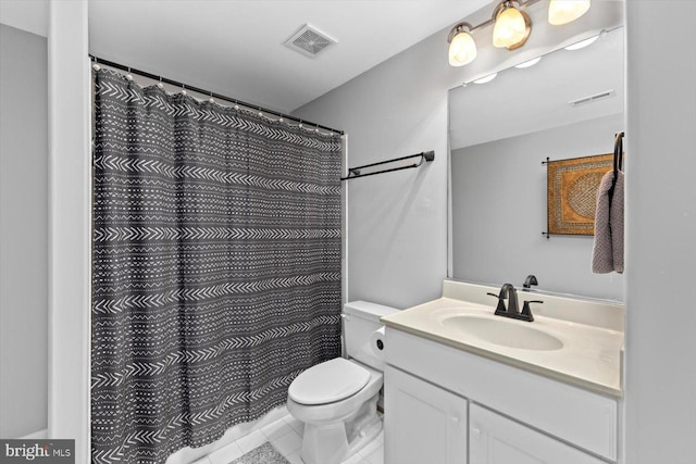full bath featuring toilet, vanity, tile patterned floors, and curtained shower