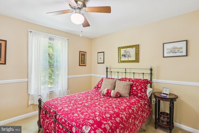 bedroom with baseboards, carpet, and ceiling fan