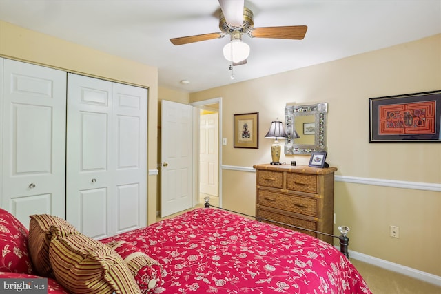 bedroom featuring carpet flooring, baseboards, ceiling fan, and a closet