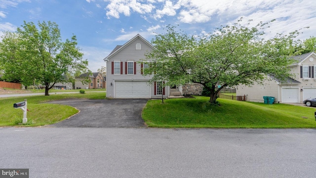 11400 Rolling Green Pl, Hagerstown, MD 21742 - view of front facade featuring an attached garage, driveway, and a front lawn