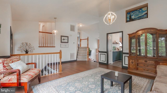 11400 Rolling Green Pl, Hagerstown, MD 21742 - living room featuring a notable chandelier, visible vents, and wood finished floors