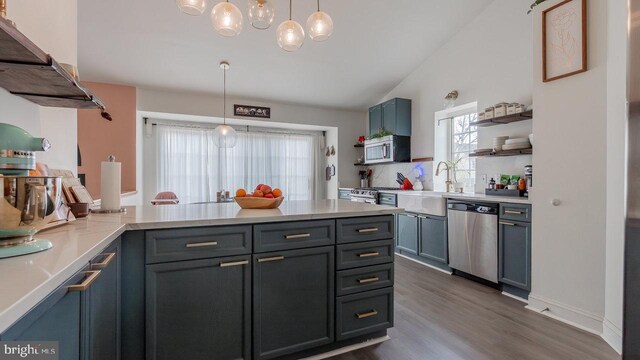 11400 Rolling Green Pl, Hagerstown, MD 21742 - kitchen featuring a sink, a peninsula, open shelves, appliances with stainless steel finishes, and dark wood-style floors