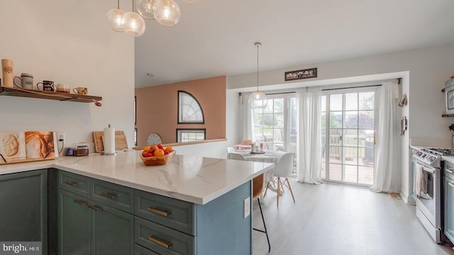 11400 Rolling Green Pl, Hagerstown, MD 21742 - kitchen with a peninsula, appliances with stainless steel finishes, green cabinetry, and light stone countertops