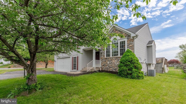 11400 Rolling Green Pl, Hagerstown, MD 21742 - view of front of property with stone siding, an attached garage, a front lawn, and aphalt driveway