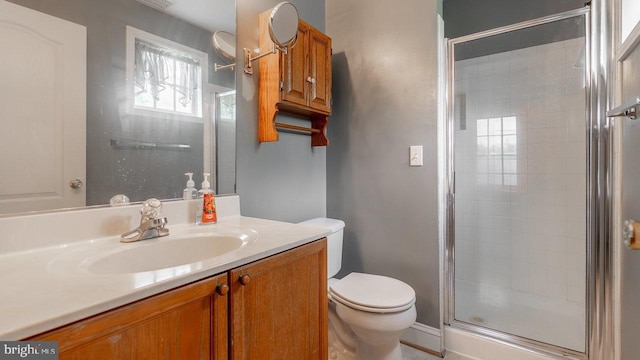 11400 Rolling Green Pl, Hagerstown, MD 21742 - full bathroom featuring vanity, toilet, and a shower stall