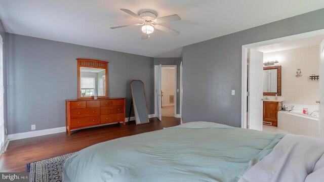 11400 Rolling Green Pl, Hagerstown, MD 21742 - bedroom with baseboards, ensuite bathroom, a ceiling fan, and wood finished floors