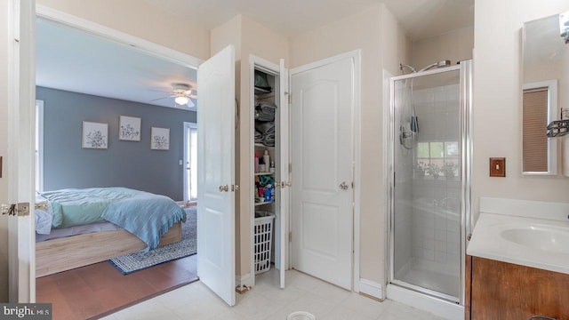 11400 Rolling Green Pl, Hagerstown, MD 21742 - ensuite bathroom with a stall shower, a ceiling fan, ensuite bathroom, vanity, and a walk in closet